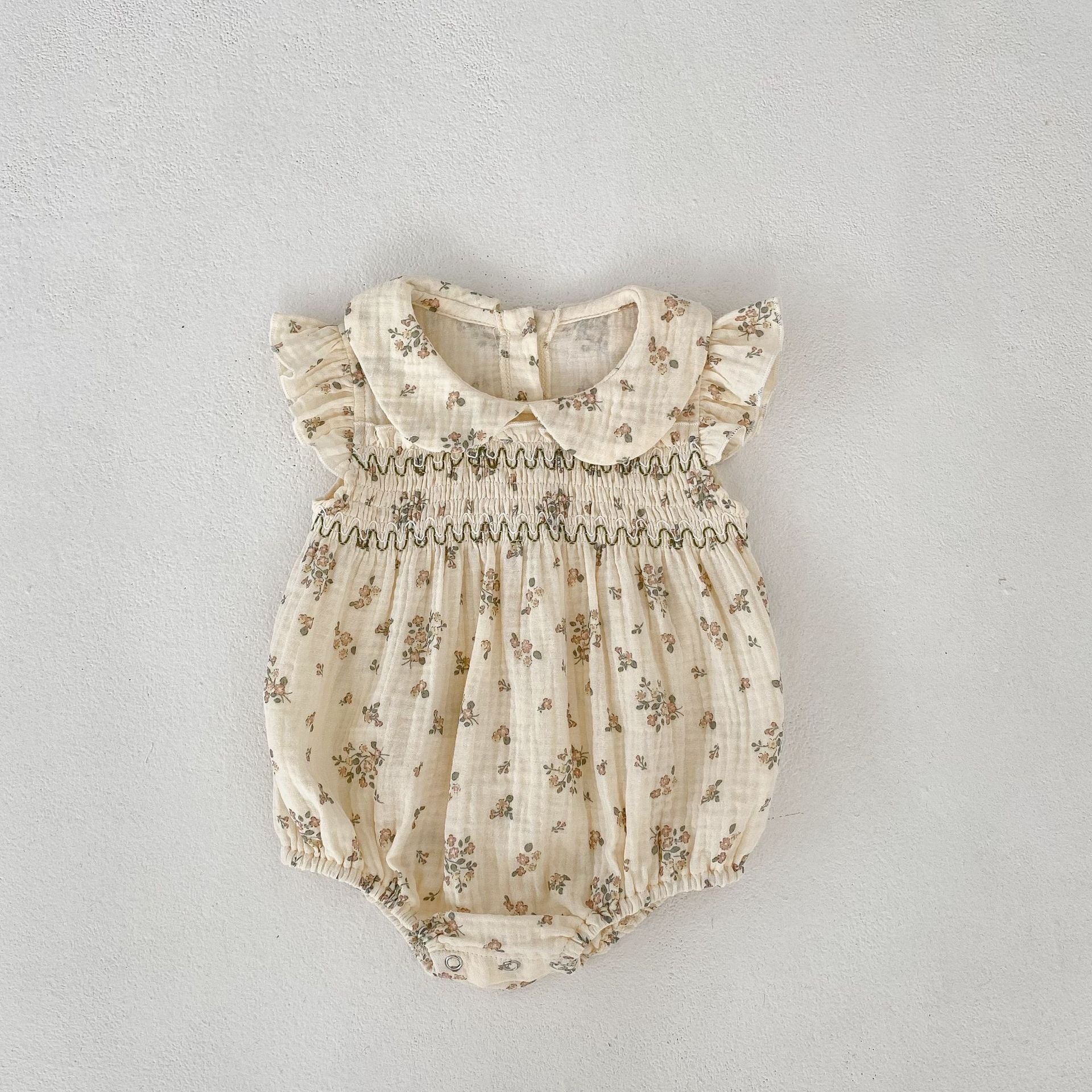 【BABY】ショルダーフリルシャーリングフローラルロンパース CawaKomostore