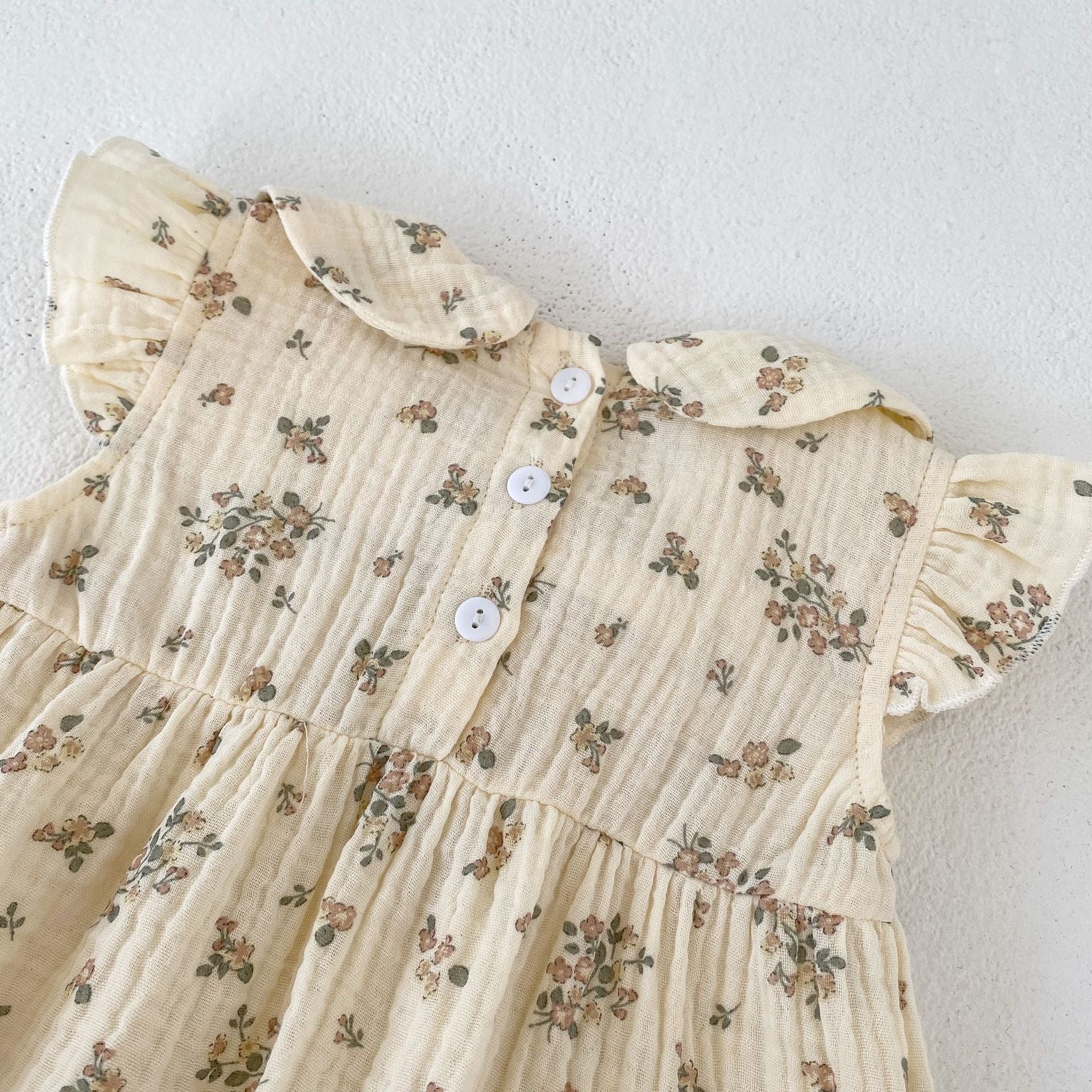 【BABY】ショルダーフリルシャーリングフローラルロンパース CawaKomostore
