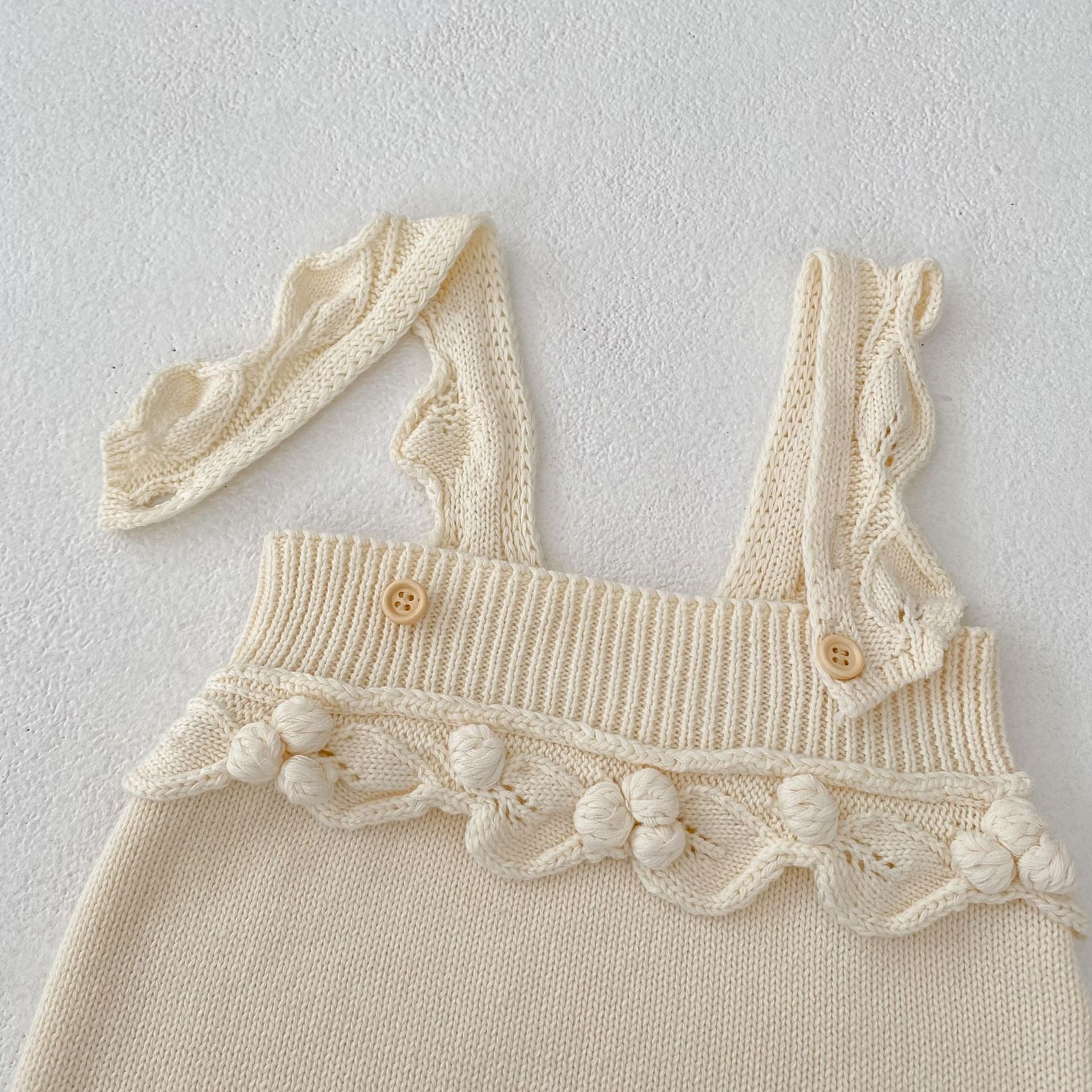 【BABY】フリルショルダー ニットロンパース