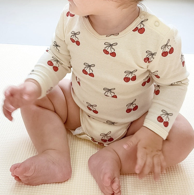 【BABY】秋コットン総柄ポインテールロンパース